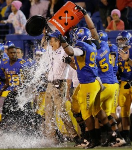 Rob Caragher gets a shower after the Spartans held off Wyoming during Saturday's homecoming game (Associated Press).